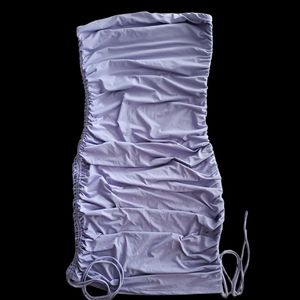 Lavender stretch cling dress with bottom ties. Size L
